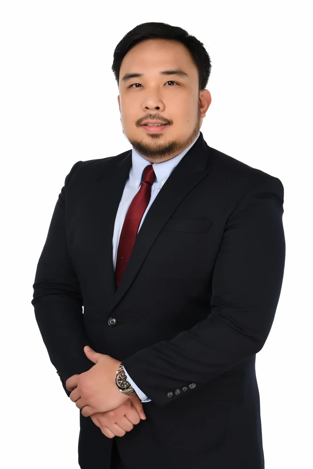 Professional portrait of Rainier Milanes.